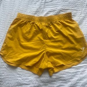 Yellow gym shark shorts